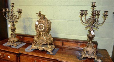 Lot 1362 - Brass three piece clock garniture