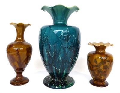 Lot 41 - 1784 1802 1986 Three Linthorpe Pottery Vases, decorated with flowers, by Fred Brown, A.T and Arthur