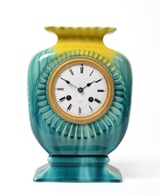 Lot 42 - 1789 A Linthorpe Pottery Mantel Clock Case, turquoise and yellow glaze, with French striking...