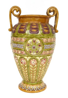 Lot 50 - 2059 A Linthorpe Pottery Twin-Handled Vase, shape No.2059, with moulded flower decoration, mustard