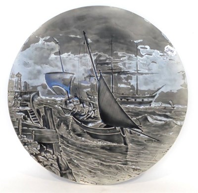 Lot 55 - A Burmantofts Faience Pottery Circular Plaque, moulded with a frigate and a fishing boat in a...