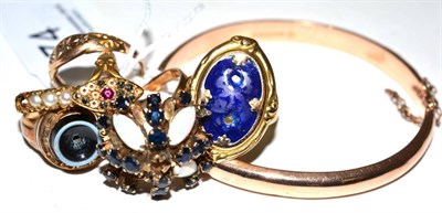 Lot 74 - A 9ct gold bangle, a 9ct gold ring and five stone set rings, all with stones missing