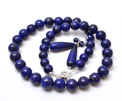 Lot 114 - A lapis lazuli necklace with clasp stamped '925' and earrings