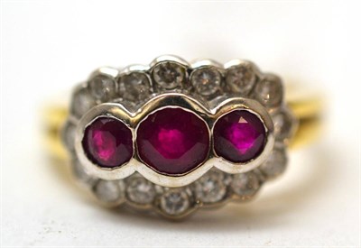 Lot 128 - An 18ct gold ruby and diamond ring