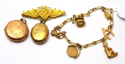 Lot 129 - A chain bracelet, a bar brooch and two lockets