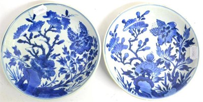 Lot 64 - A Pair of Chinese Porcelain Saucer Dishes, painted in underglaze blue with flowers and...