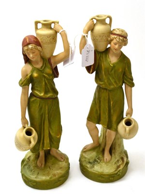 Lot 145 - Pair of Royal Dux figures of water carriers