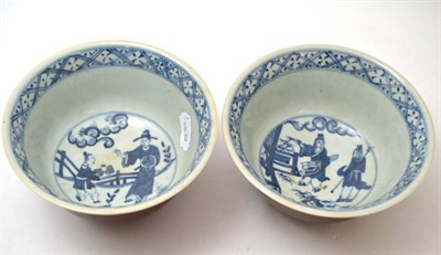 Lot 177 - A pair of Chinese bowls, decorated in blue and white interior depicting figures