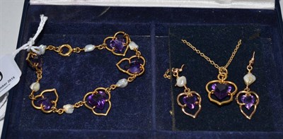 Lot 189 - An amethyst and baroque pearl bracelet, earrings and pendant set, the bracelet catch stamped 15c