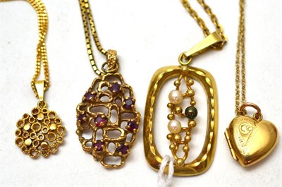 Lot 204 - A group of four pendants on chains