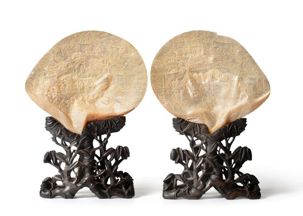 Lot 72 - A Pair of Chinese Carved Mother-of-Pearl Shells, 19th century, each carved with figures amongst...