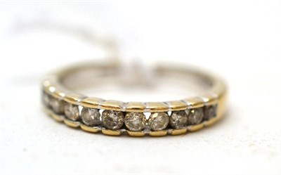 Lot 208 - A diamond half hoop ring