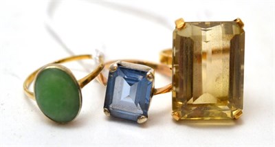 Lot 209 - A citrine ring, a synthetic blue spinel ring and a jade ring (3)