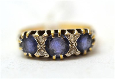 Lot 210 - A sapphire and diamond ring