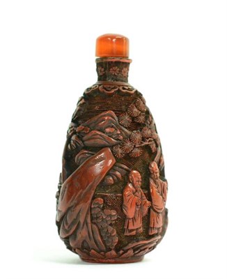 Lot 73 - A Chinese Cinnabar Lacquer Snuff Bottle and Stopper, Qing Dynasty, of pear form, carved with...