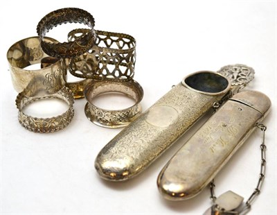 Lot 218 - A group of silver including six napkin rings and two silver glasses cases