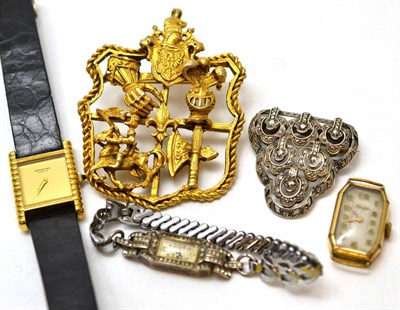 Lot 219 - A Raymond Weil wristwatch, two others, a heraldic brooch pendant and a brooch