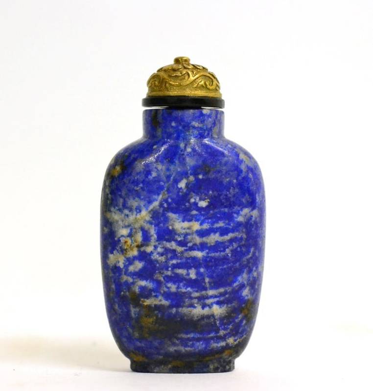 Lot 74 - A Chinese Lapis Lazuli Snuff Bottle and Metal Stopper, Qing Dynasty, of flattened ovoid form, 6.5cm