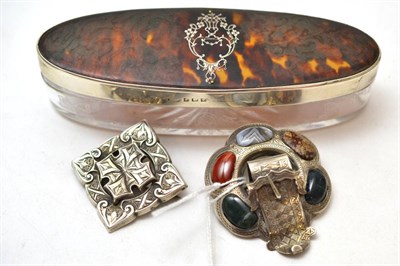 Lot 225 - A Scottish hardstone brooch, another brooch and a silver trimmed trinket box (3)