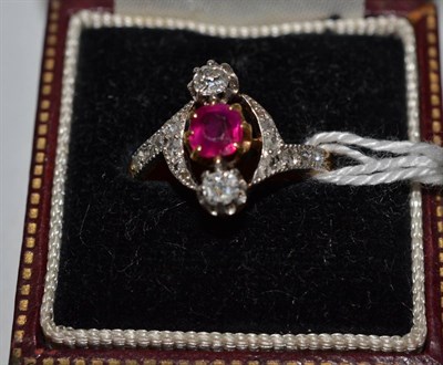 Lot 233 - Ruby and diamond three stone Victorian ring, claw set in 18ct white-yellow gold to diamond set...