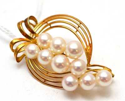 Lot 238 - A cultured pearl brooch, by Mikimoto, stamped 'K14'