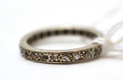 Lot 240 - A diamond eternity ring (worn)