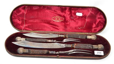 Lot 259 - A four piece cased antler handled carving set by Joseph Rodgers & Sons