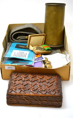 Lot 261 - Small collection of militaria including a shell case, medals, webbing and wooden box