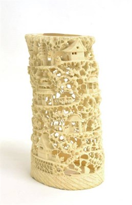 Lot 81 - A Cantonese Ivory Tusk Vase, 19th century, intricately carved and pierced with figures amongst...