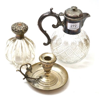 Lot 272 - A white metal mounted claret jug, a white metal chamberstick and a silver mounted scent bottle