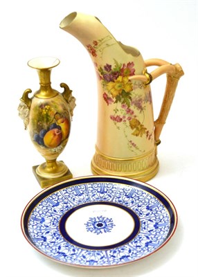 Lot 279 - Three pieces of Royal Worcester - a fruit painted urn by Rickettes, blush ivory jug and a plate...