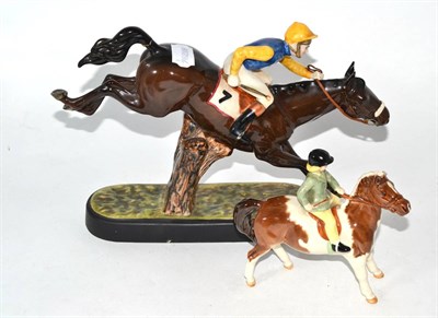 Lot 297 - Two mounted Beswick figures comprising Steeplechaser and Girl on Skewbald Pony (all a.f.)