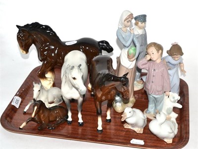 Lot 303 - A tray of Beswick horses, Royal Doulton foal, Lladro, Nao etc