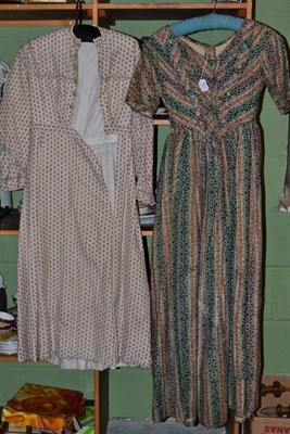 Lot 311 - 19th century printed cotton dress, with striped floral design in green and browns, fitted bodice, v