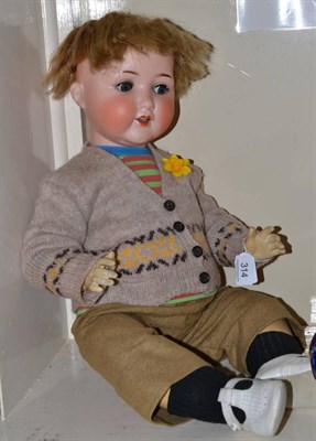 Lot 314 - Large Armand Marseille bisque socket head doll impressed '995' '14' with blond wig, sleeping...