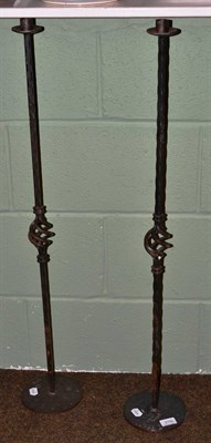 Lot 319 - Pair of Arts & Crafts style candle stands