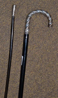 Lot 331 - A walking stick with long shaft and barley twist white metal handle, together with a swagger...