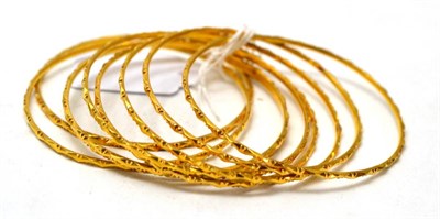 Lot 353 - Nine fancy bangles, purchased in Tanzania