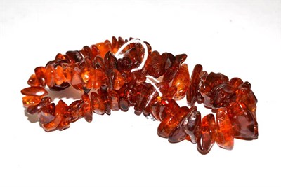 Lot 377 - An amber bead necklace