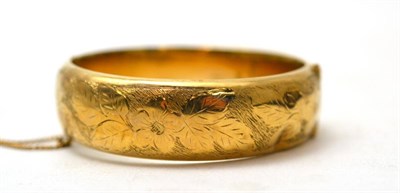 Lot 390 - A 9ct gold bangle