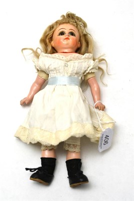 Lot 406 - Late 19th century wax over Schilling type doll, with fixed brown eyes, blond wig on fabric and...