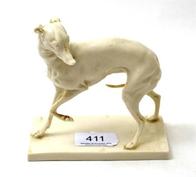 Lot 411 - A Continental porcelain model of a greyhound on plinth base, possibly Sitzendorf