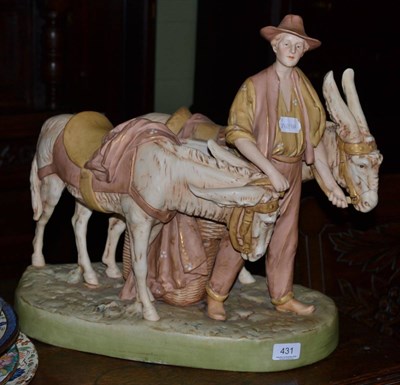 Lot 431 - A Royal Dux figure, boy with donkeys (a.f.)