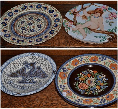 Lot 432 - A 19th century majolica charger, together with another, brown ground, a Wedgwood lustre ware...