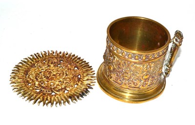 Lot 446 - A silver gilt roundel as the sun in splendour and a brass string box with scissor stand