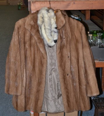 Lot 1011 - Light brown mink jacket with shaped hem, Mitzi Lorenz mink hat with brown suede lace detailing,...