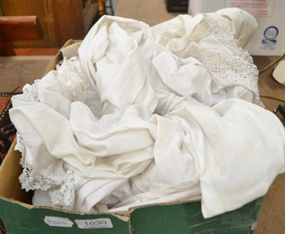 Lot 1030 - Assorted Victorian and later white cotton undergarments, lace trims, linens etc (one box)