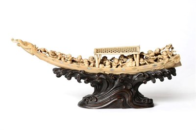 Lot 111 - A Japanese Ivory Okimono as the Takarabune, Meiji period, the dragon boat with mother-of-pearl...