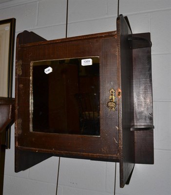 Lot 1069 - Small oak glazed cupboard