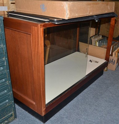 Lot 1082 - A glazed shop display cabinet